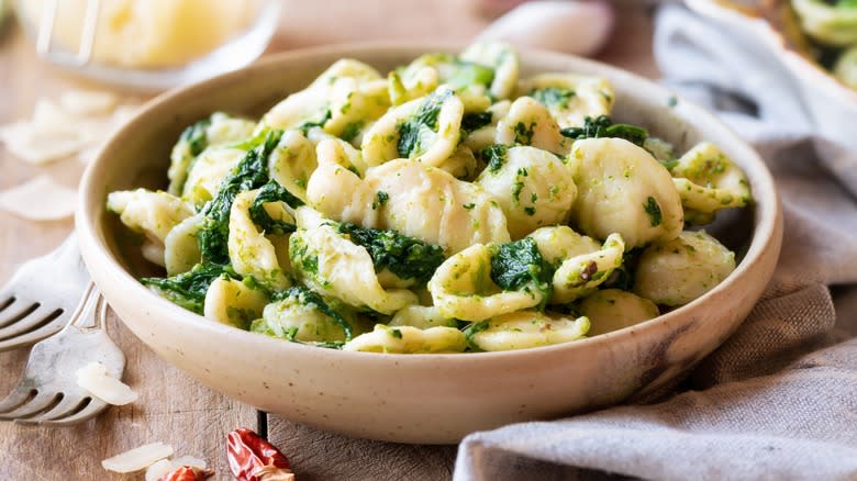 bowl of pasta with spinach