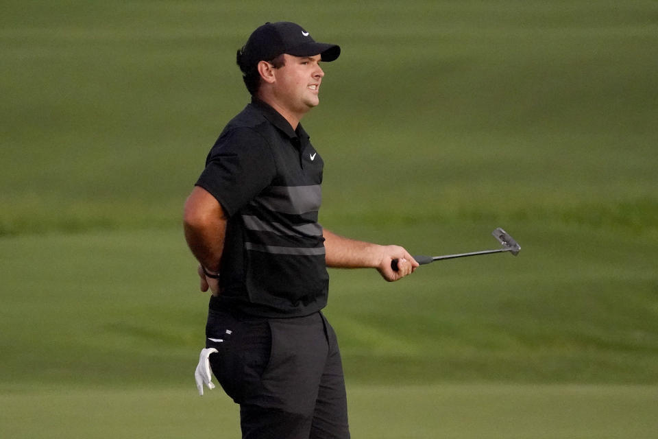 Patrick Reed reacts to missing his putt on the third playoff hole on the 18th green during final round of the Tournament of Champions golf event, Sunday, Jan. 5, 2020, at Kapalua Plantation Course in Kapalua, Hawaii. (AP Photo/Matt York)