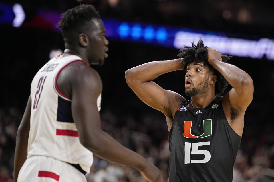 Miami forward Norchad Omier reacts against Connecticut during the second half of a Final Four college basketball game in the NCAA Tournament on Saturday, April 1, 2023, in Houston. (AP Photo/Brynn Anderson)