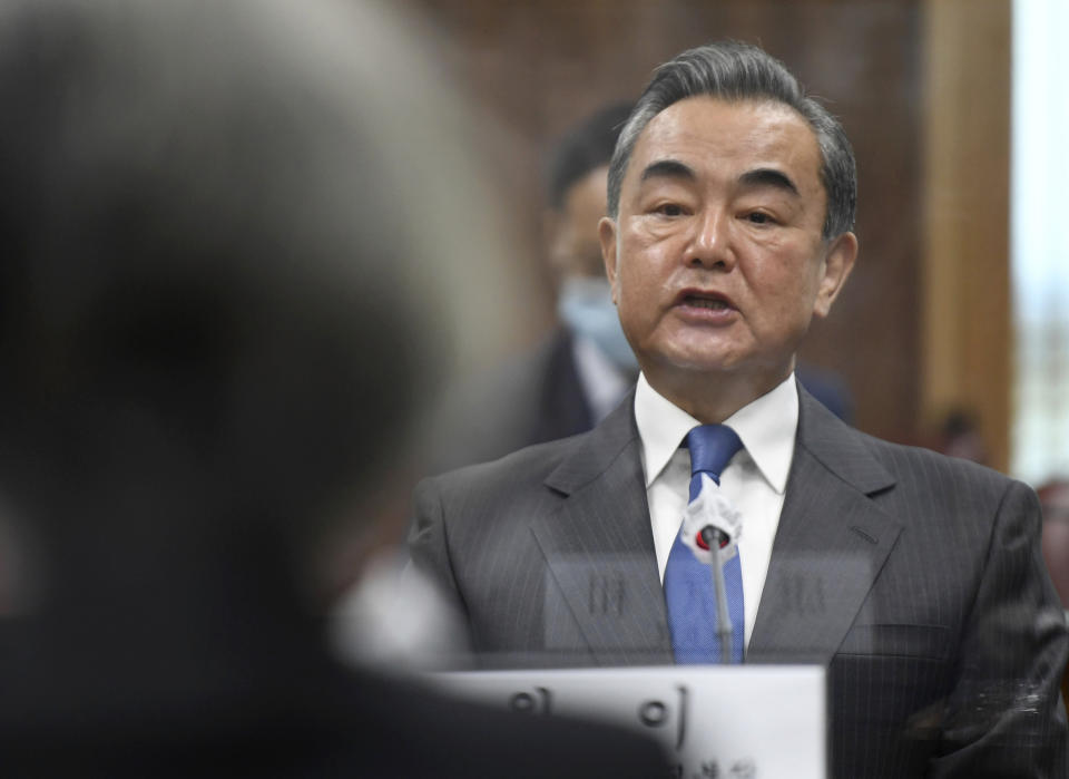Chinese Foreign Minister Wang Yi talks with South Korean Foreign Minister Kang Kyung-wha during their meeting at the foreign ministry in Seoul, South Korea, Thursday, Nov. 26, 2020. Wang arrived in Seoul on Nov. 25, for a three-day state visit.(Kim Min-hee/Pool Photo via AP)