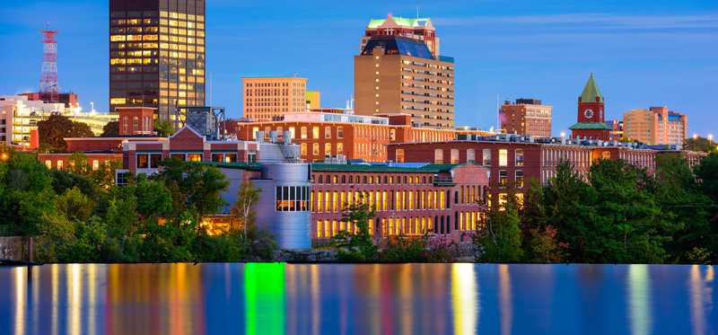 New Hampshire city buildings and body of water.