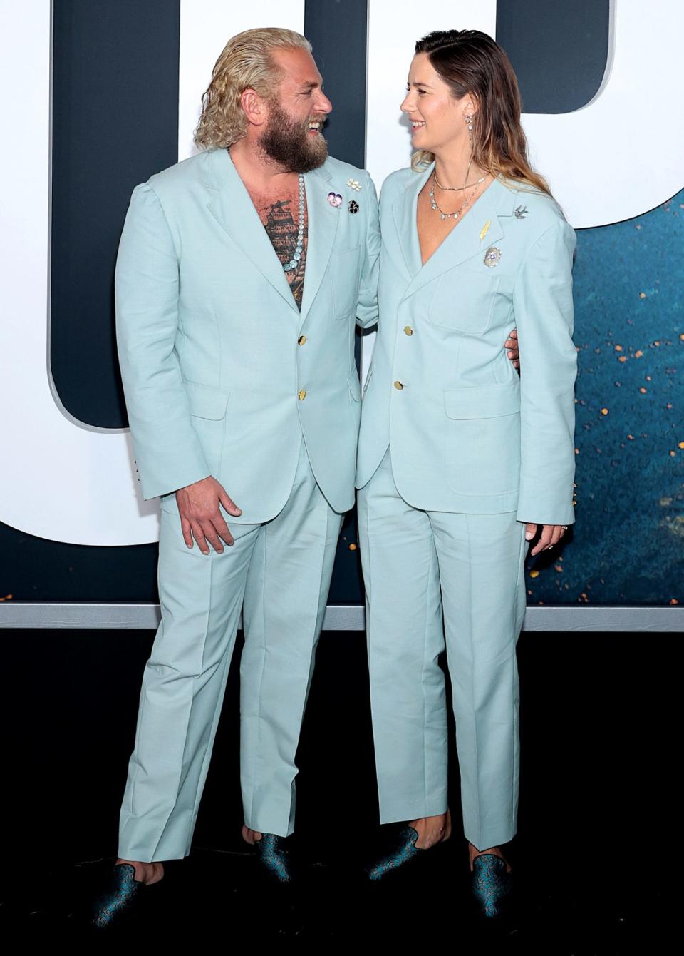 <p>It's impossible to be blue when you're looking at these two matchy-matchy lovebirds! Jonah Hill and girlfriend Sarah Brady made an unforgettable red carpet debut at the premiere of <em>Don't Look Up</em>, <a href="https://people.com/style/jonah-hill-girlfriend-sarah-brady-matching-gucci-suits/" rel="nofollow noopener" target="_blank" data-ylk="slk:donning matching light blue Gucci pantsuits;elm:context_link;itc:0;sec:content-canvas" class="link ">donning matching light blue Gucci pantsuits</a> and teal loafers. </p>