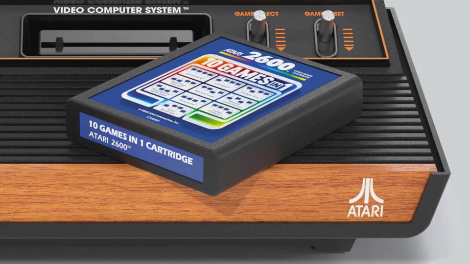 close up of Atari 2600+ console with game on top