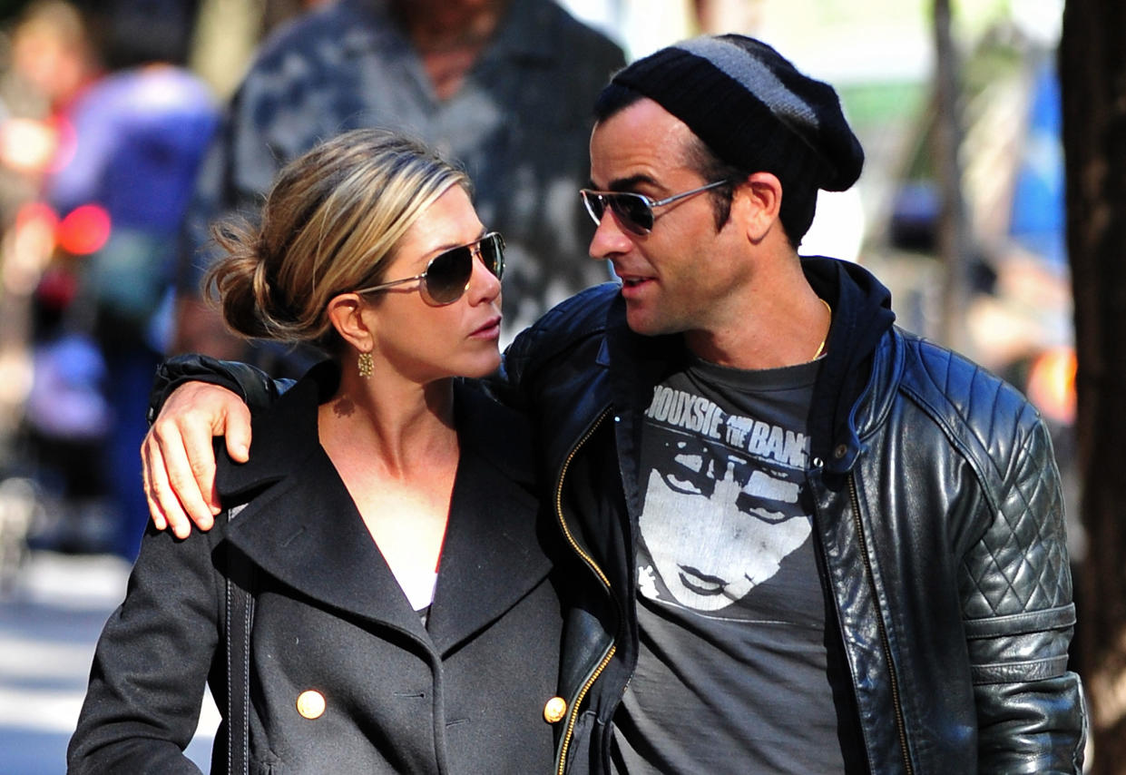 NEW YORK, NY - SEPTEMBER 18:  Jennifer Aniston and Justin Theroux walk in the West Village on September 18, 2011 in New York City.  (Photo by James Devaney/WireImage)