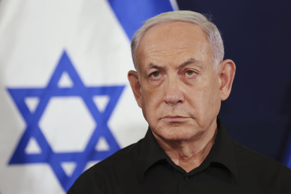 FILE - Israeli Prime Minister Benjamin Netanyahu attends a press conference in the Kirya military base in Tel Aviv, Israel on Oct. 28, 2023. Top Israeli officials are accused of seven war crimes and crimes against humanity by the ICC. (Abir Sultan/Pool Photo via AP, File)
