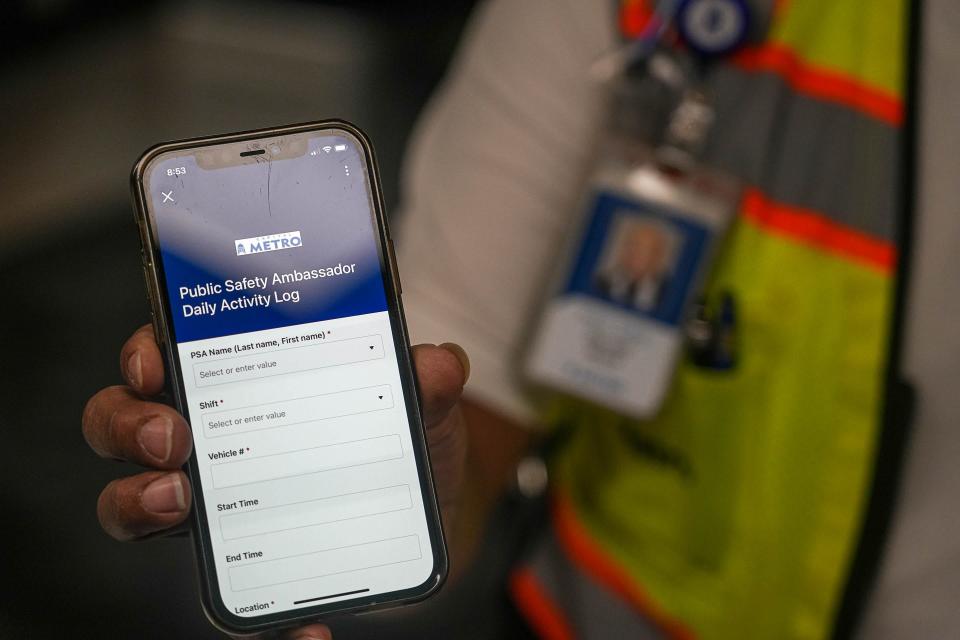 CapMetro public safety ambassador Darrell Hunt shows the app that the ambassadors use to log daily activity and incidents.