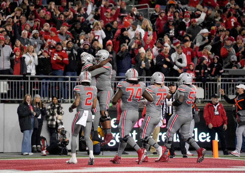 Nov 11, 2023; Columbus, Ohio, USA; Ohio State Buckeyes wide receiver Marvin Harrison Jr. (18) celebrates his touchdown in the first quarter during the NCAA football game against Michigan State University at Ohio Stadium.