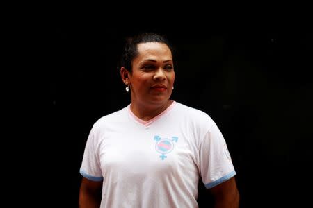 Karla Avelar, executive director of the Association for Communicating and Training Trans Women (COMCAVIS TRANS), pose for a picture at her office in San Salvador, El Salvador, May 12, 2017. REUTERS/Jose Cabezas