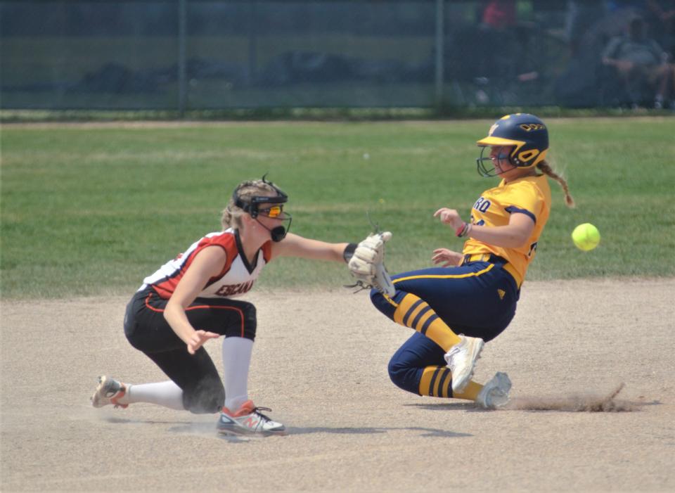 Braleigh Miller slides into second after stealing during an MHSAA Division 2 district semifinal between Gaylord and Escanaba on Saturday, June 3 in Gaylord, Mich.
