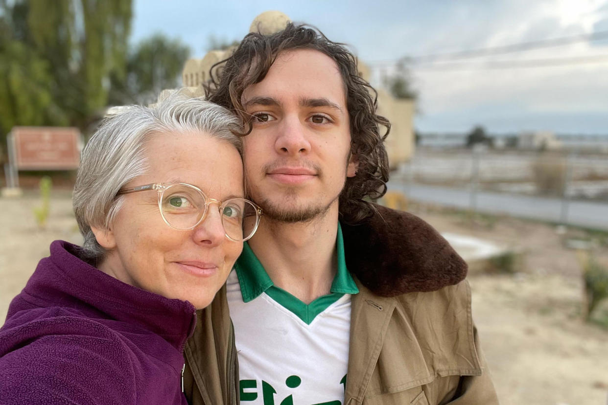 Hisham Awartani and his mother Elizabeth Price pose for a photo. (Courtesy Elizabeth Price )