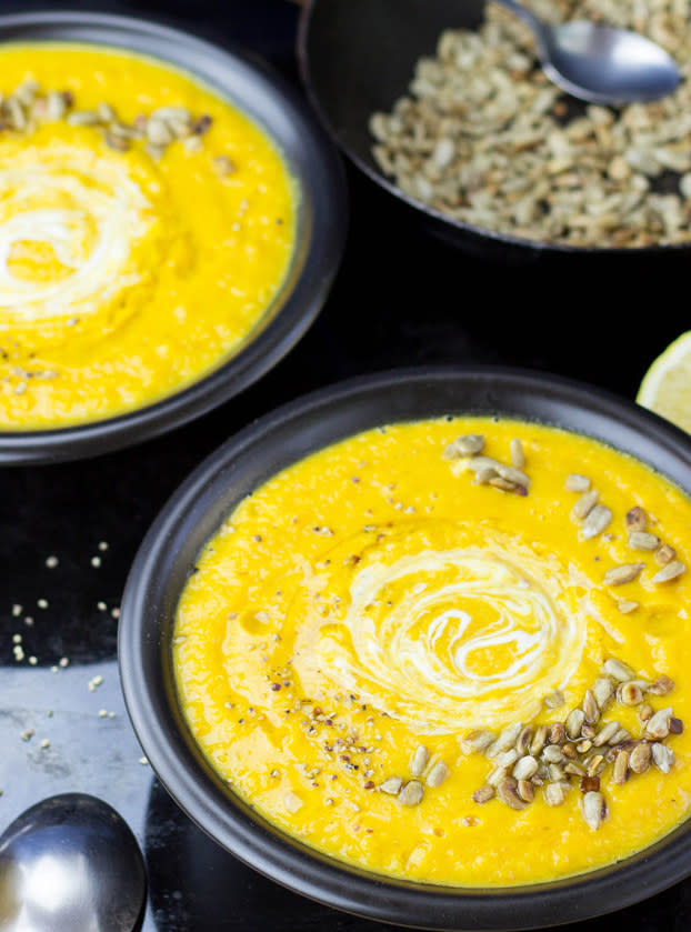 bowl of soup with sprinkled seeds on top