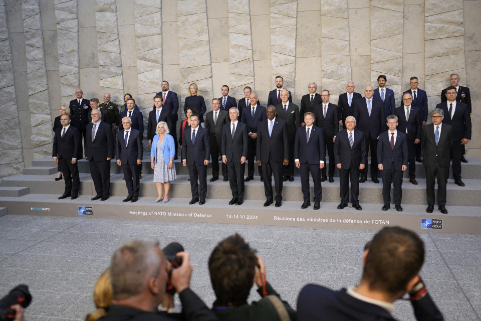 NATO defense ministers pose for a group photo during a meeting of NATO defense ministers at NATO headquarters in Brussels, Friday, June 14, 2024. (AP Photo/Virginia Mayo)