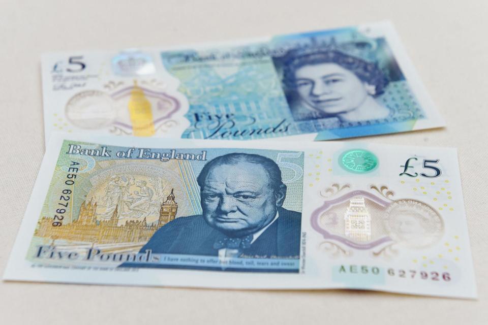 The new £5 note was introduced in September last year: Getty Images