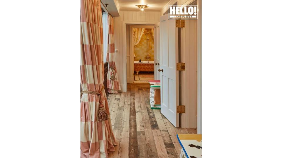 Charlotte and Philip Colbert's hallway with checked pink curtains in East London