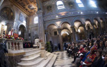 Pope Francis (L) leads a mass at the Basilica of Saint Bartholomew on Tiber island in Rome, April 22, 2017. REUTERS/Maurizio Brambatti/Pool