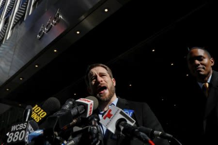 Housing Rights Initiative Executive Director Aaron Carr speaks during a news conference, outside 666 5th Avenue regarding the Kushner Companies falsifying work permits with the City's Department of Buildings, in New York, U.S., March 19, 2018. REUTERS/Brendan McDermid