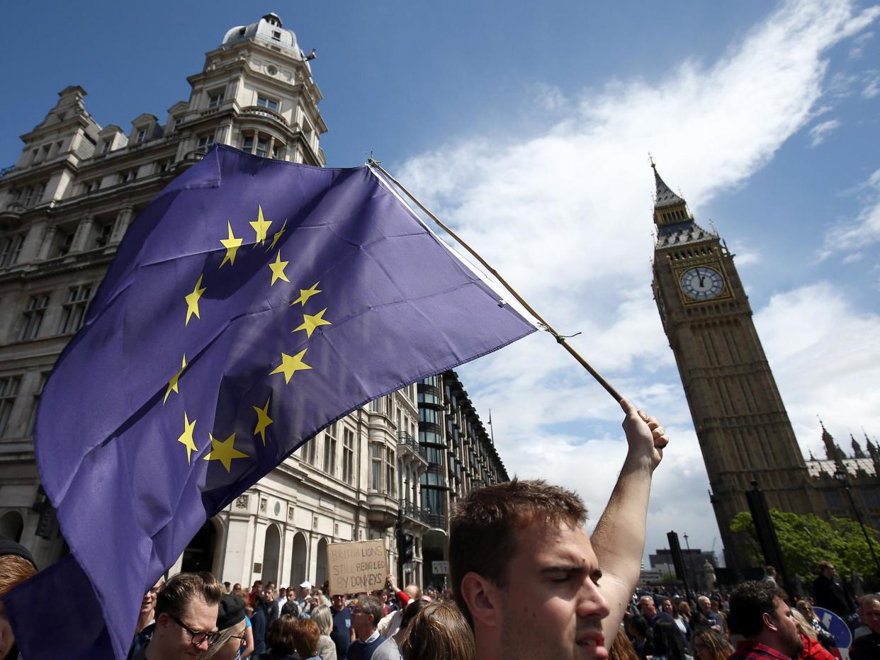 People hold banners during a demonstration against Britain's decision to leave the European Union: Reuters