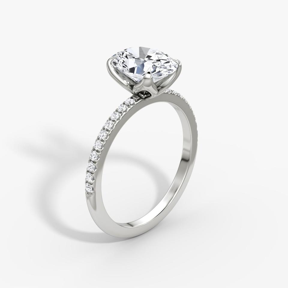 <p><a href="https://go.redirectingat.com?id=74968X1596630&url=https%3A%2F%2Fwww.vrai.com%2Fengagement-rings%2Fpetal-classic-ring%2Foval%2Fwhite-gold%3Fflow%3Dsetting%26bandAccent%3Dpave&sref=https%3A%2F%2F" rel="nofollow noopener" target="_blank" data-ylk="slk:Shop Now;elm:context_link;itc:0;sec:content-canvas" class="link ">Shop Now</a></p><p>The Classic Petal Oval Engagement Ring</p><p>vrai.com</p><p>$1250.00</p><span class="copyright">Vrai</span>