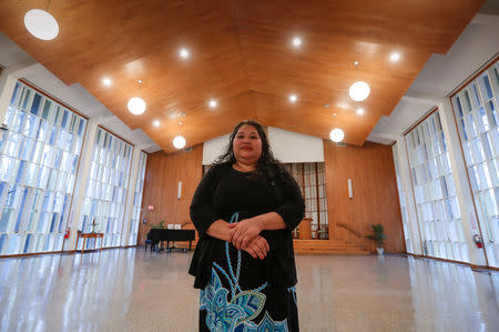 Undocumented Salvadoran immigrant Rosa Gutierrez Lopez stands in the Unitarian Universalist Church where she has been given sanctuary while pressing her case for asylum, in Bethesda, Maryland, U.S., January 2, 2019. REUTERS/Kevin Lamarque