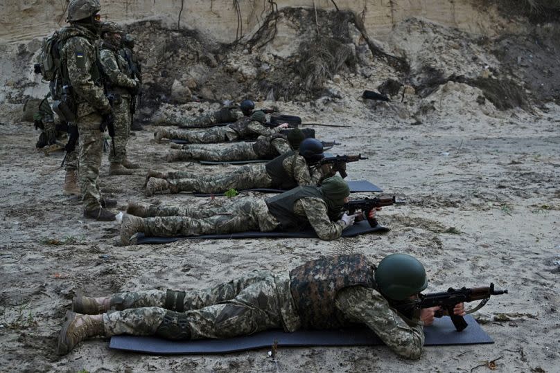 Members of a newly-formed "Siberian Battalion" within the Ukrainian Armed Forces take part in a military training exercise outside Kyiv on October 24, 2023