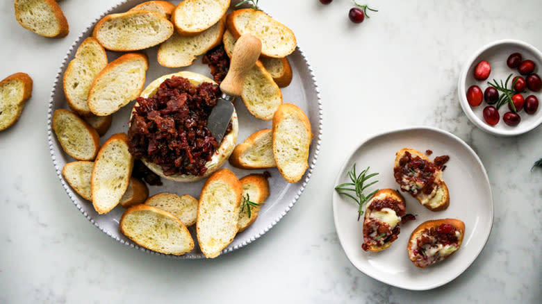 cranberry bacon baked brie with crostini