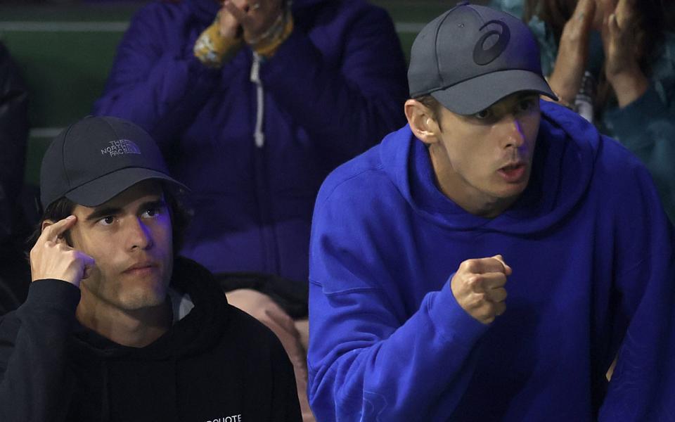 (L-R) Coach Damian Rodriguez and boyfriend/professional tennis player Alex De Minaur react to a point by Katie Boulter of Great Britain over Marta Kostyuk of Ukraine during the San Diego Open 2024 Singles Final