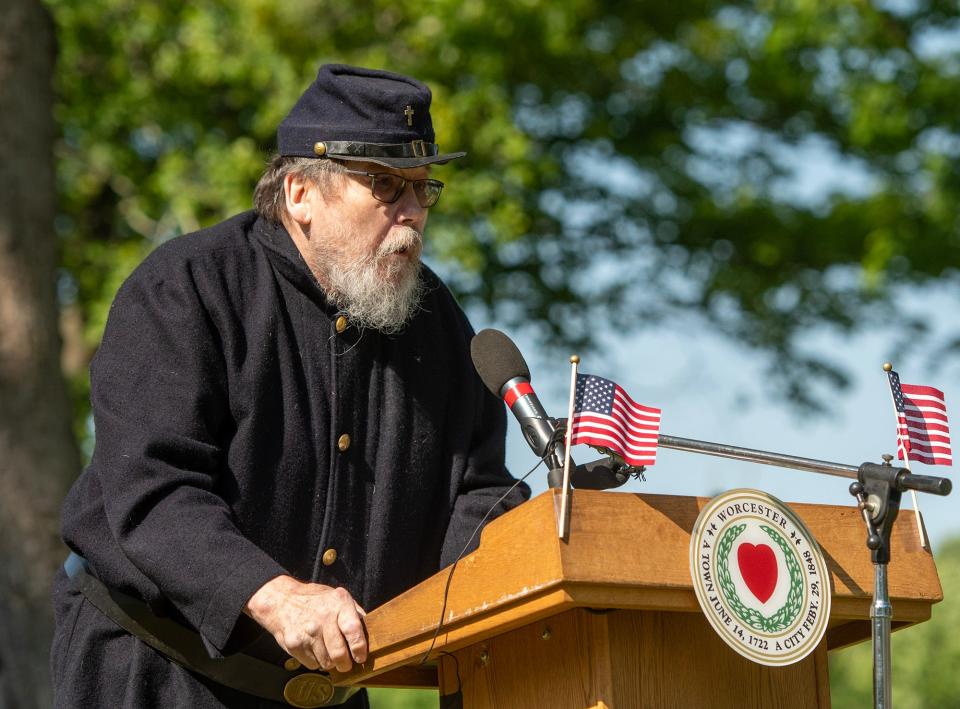 Mark Ziemba reads Logan’s Orders during the city’s Memorial Day ceremony in Hope Cemetery Monday. Ziemba is a member of Sons of Union Veterans of the Civil War, Willie Grout Camp 25.