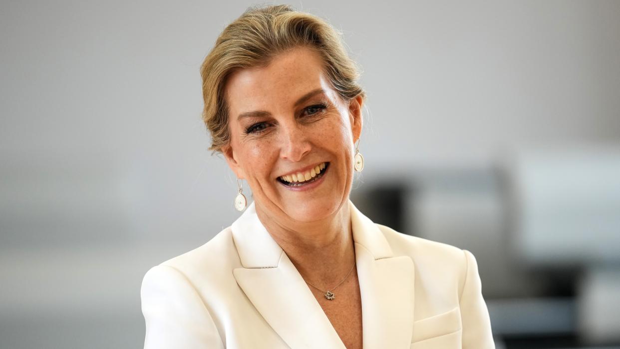  Sophie, Duchess Of Edinburgh, smiles as she listens to a music class during a visit to The Seashell Trust. 