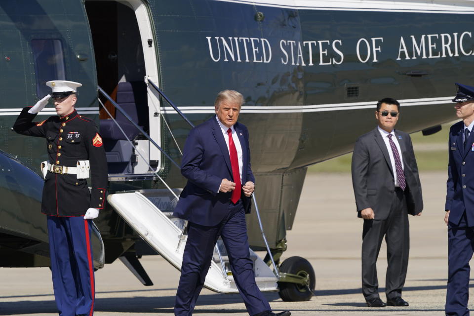 President Donald Trump walks from Marine One towards Air Force One at Andrews Air Force Base, Md., Wednesday, Sept. 30, 2020. Fresh off the first presidential debate, Trump is returning to the battleground state of Minnesota for a rally and fundraiser. (AP Photo/Susan Walsh)