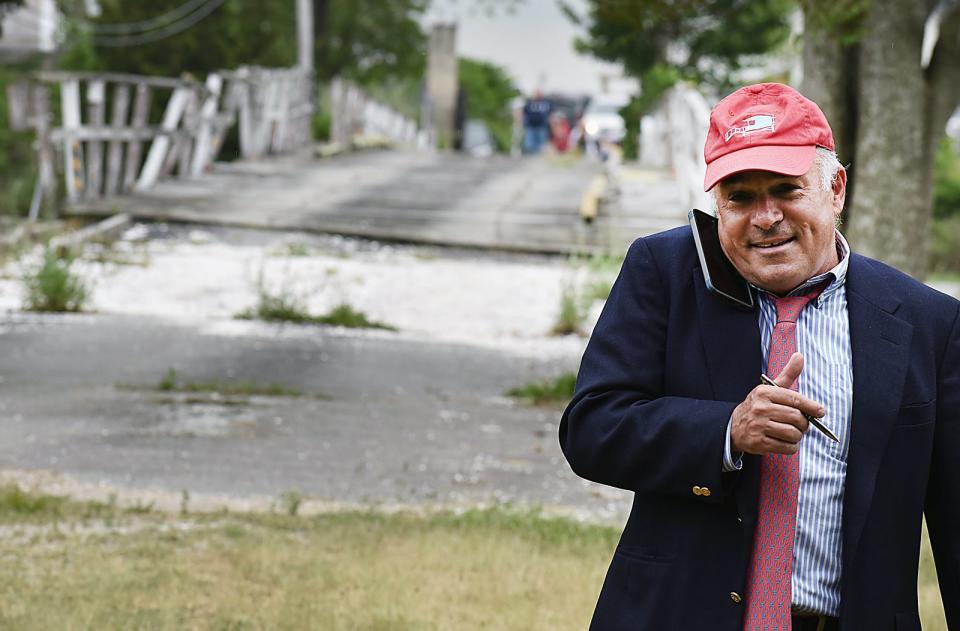 Auctioneer George Collias on Pleasure Island Thursday.