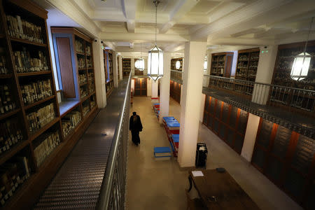 Librarian, Father Justin of Sinai, walks inside the library of St. Catherine's Monastery in South Sinai, Egypt, March 6, 2019. REUTERS/Mohamed Abd El Ghany