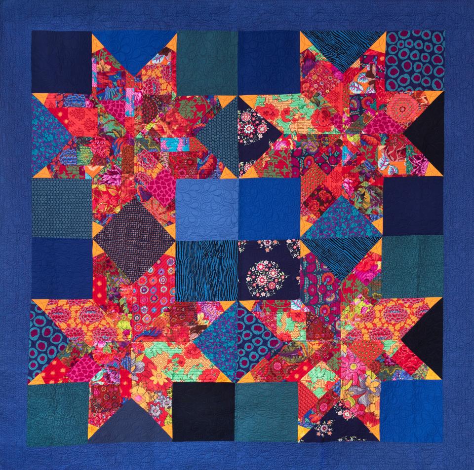 “Big Box Stars/Red,” quilt by Victoria Finlay Wolfe.