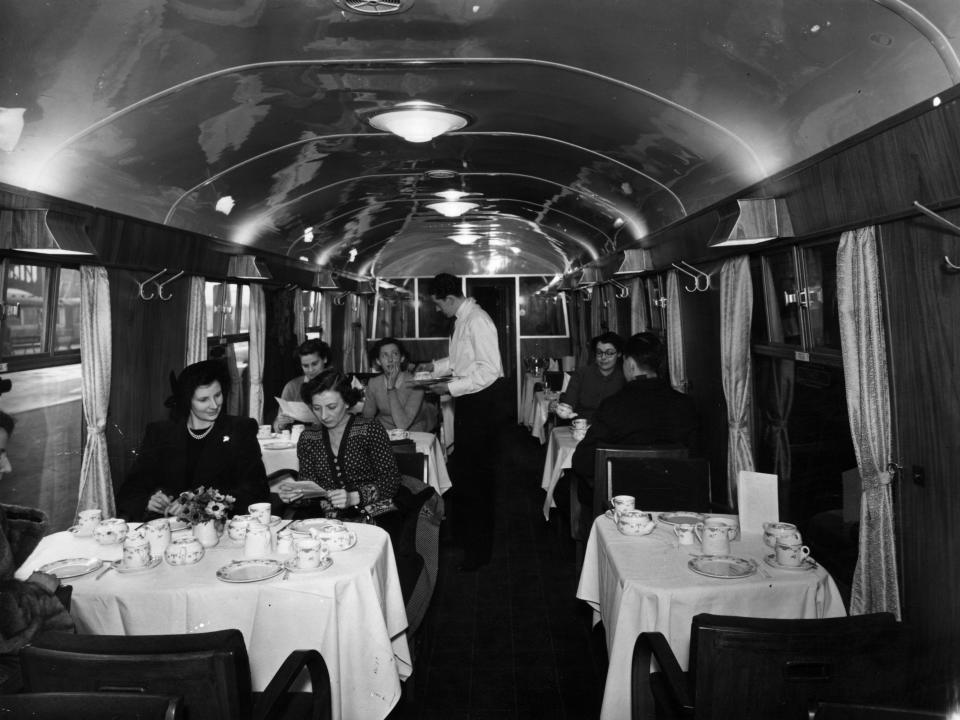 Passengers in a first-class dining saloon in 1951.