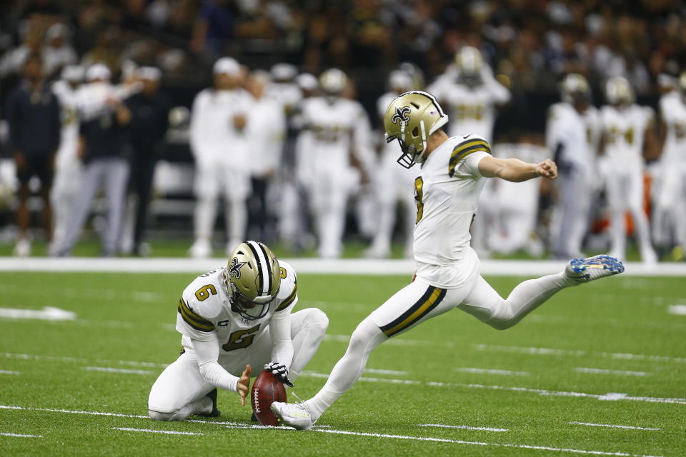 New Orleans Saints kicker Wil Lutz (3) kicks a field goal as Thomas Morstead (6) holds in the first half of an NFL football game against the Dallas Cowboys in New Orleans, Sunday, Sept. 29, 2019. The Saints won 12-10. (AP Photo/Butch Dill)