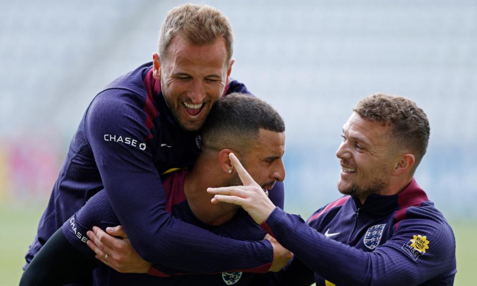 <span>Harry Kane, Kyle Walker and Kieran Trippier during <a class="link " href="https://sports.yahoo.com/soccer/teams/england/" data-i13n="sec:content-canvas;subsec:anchor_text;elm:context_link" data-ylk="slk:England;sec:content-canvas;subsec:anchor_text;elm:context_link;itc:0">England</a>’s lively training session at Carl Zeiss Jena’s stadium on Tuesday.</span><span>Photograph: John Sibley/Reuters</span>