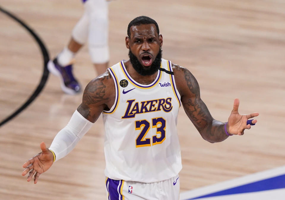 Los Angeles Lakers' LeBron James (23) reacts after no foul was called against the Miami Heat during the second half in Game 3 of basketball's NBA Finals, Sunday, Oct. 4, 2020, in Lake Buena Vista, Fla. (AP Photo/Mark J. Terrill)