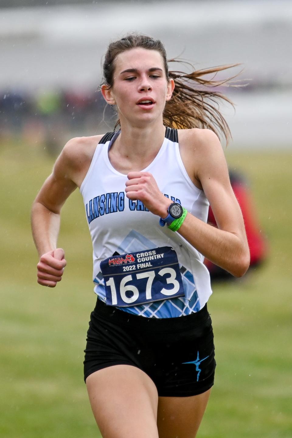 Lansing Catholic's Hannah Pricco approaches the finish line during the Division 3 state cross country final on Saturday, Nov. 5, 2022, at Michigan International Speedway in Brooklyn.