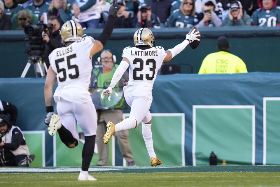 New Orleans Saints cornerback Marshon Lattimore (23) returns an interception for a touchdown in the second half of an NFL football game against the Philadelphia Eagles in Philadelphia, Sunday, Jan. 1, 2023. (AP Photo/Matt Rourke)