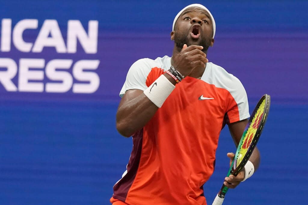 Frances Tiafoe reacts during a quarterfinal match against Andrey Rublev, of Russia, at the U.S. Open tennis championships, Wednesday, Sept. 7, 2022, in New York. (AP Photo/Mary Altaffer)