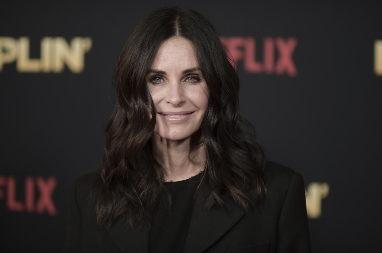 Courteney Cox attends the world premiere of "Dumplin'" at TCL Chinese Theatre on Thursday, Dec. 6, 2018, in Los Angeles. (Photo by Richard Shotwell/Invision/AP)