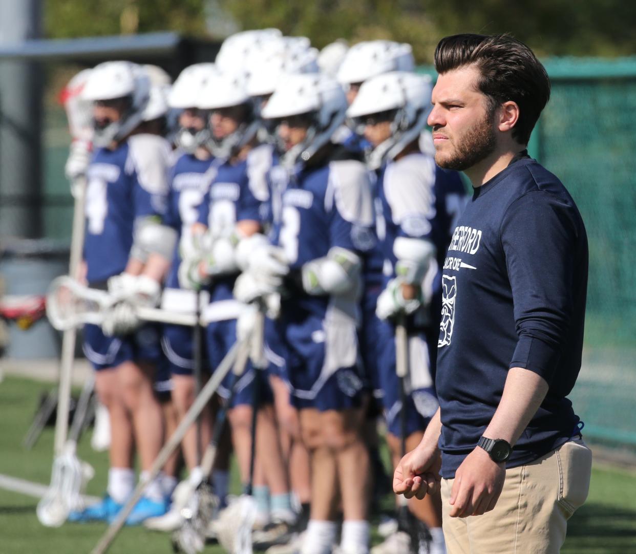 Rutherford boys lacrosse head coach Michael Foster on the sidelines as his team played at Nutley on April 28, 2022.