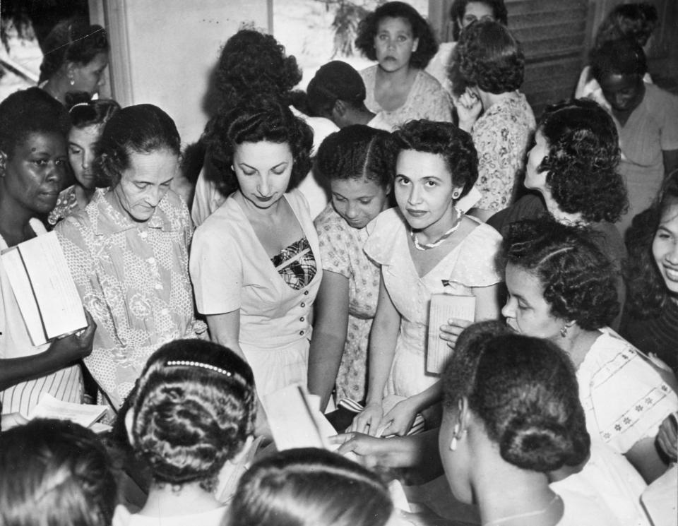 Puerto Rican women register to vote on the territorial constitution, San Juan, Puerto Rico, November 1950.