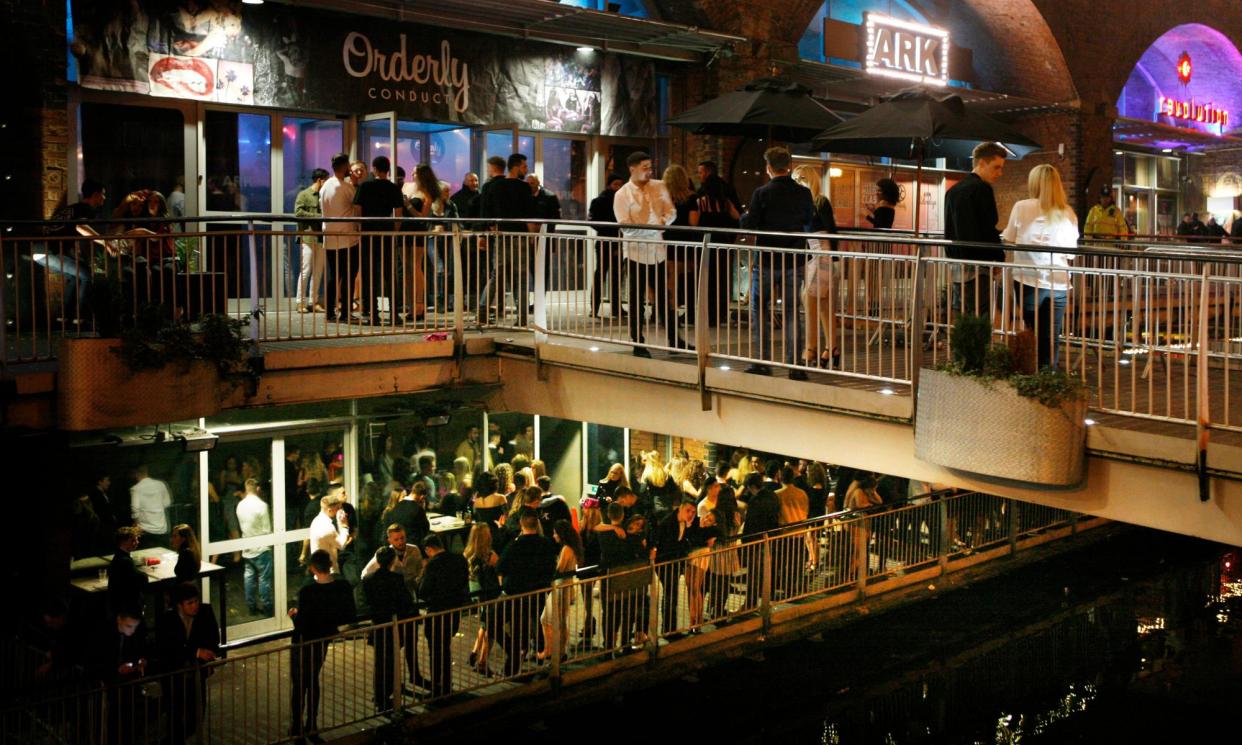 <span>Nightlife around Deansgate Lock in Manchester. The voyeuristic videos appear to target young women wearing tight clothes or short dresses.</span><span>Photograph: Gary Calton/The Observer</span>