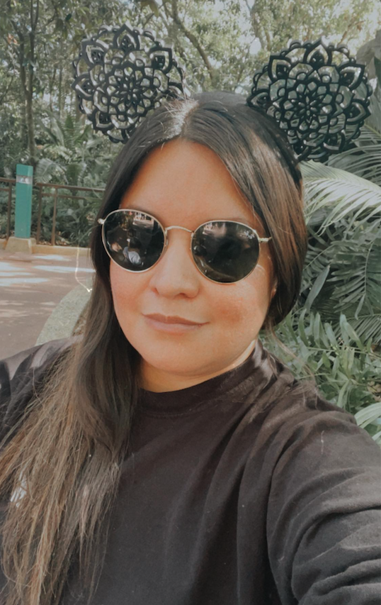 Christa Estrada strikes a pose at Disney's Animal Kingdom.