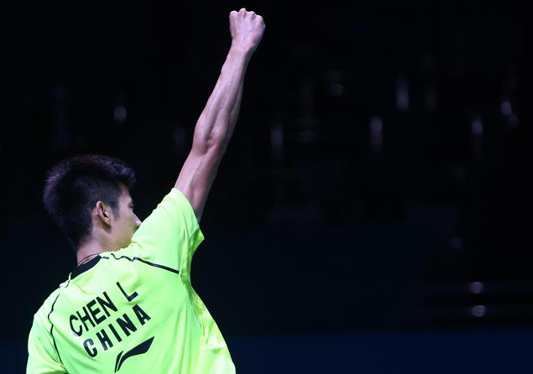 Badminton player Chen Long of China celebrates in Dubai on December 21, 2014