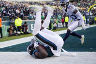 Philadelphia Eagles' A.J. Brown falls after scoring a touchdown during the second half of an NFL football game against the Tennessee Titans, Sunday, Dec. 4, 2022, in Philadelphia. (AP Photo/Matt Slocum)
