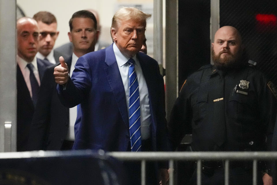 Former President Donald Trump returns to the courtroom after a recess at Manhattan criminal court, Tuesday, April 16, 2024, in New York. Donald Trump returned to the courtroom Tuesday as a judge works to find a panel of jurors who will decide whether the former president is guilty of criminal charges alleging he falsified business records to cover up a sex scandal during the 2016 campaign. (AP Photo/Mary Altaffer, Pool)