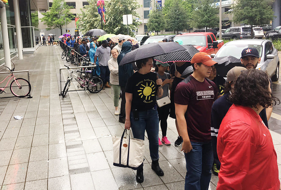 People wait in line to volunteer at George R. Brown Convention Center in Houston.<i></i> (Photo: Andy Campbell/HuffPost)