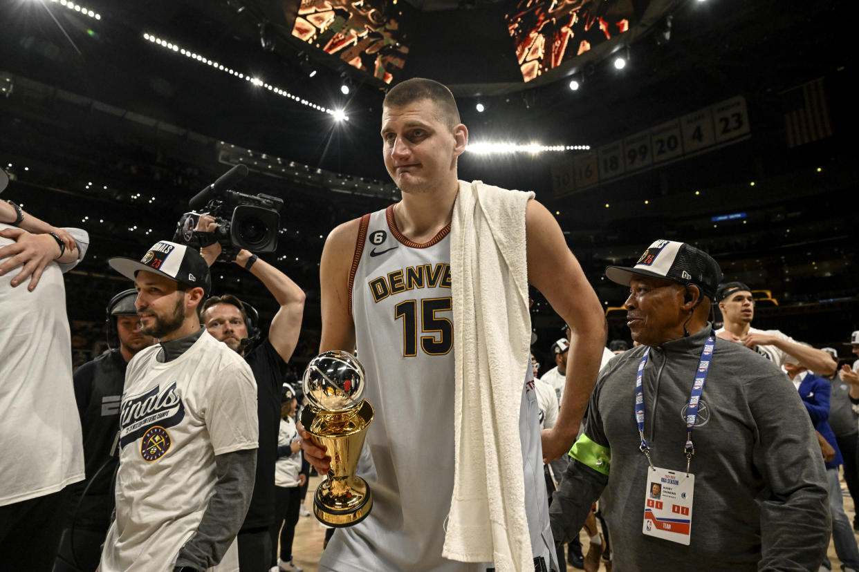 LOS ANGELES, CA - MAY 22: Nikola Jokic (15) of the Denver Nuggets leaves the floor with his MVP trophy in hand after the fourth quarter of the Nuggets' 113-111 Western Conference finals game 4 win over the Los Angeles Lakers at Crypto.com Arena in Los Angeles on Monday, May 22, 2023. The Nuggets swept the best-of-seven series 4-0 to advance to their first NBA Finals in franchise history. (Photo by AAron Ontiveroz/The Denver Post)