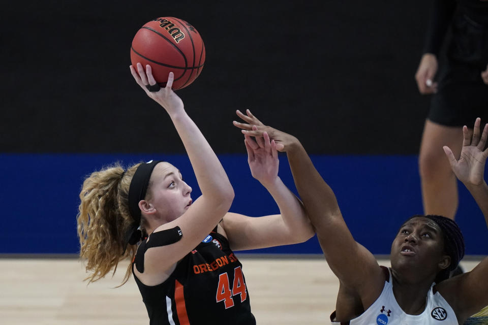 Oregon State forward Taylor Jones (44) shoots over South Carolina forward Aliyah Boston, right, during the second half of a college basketball game in the second round of the women's NCAA tournament at the Alamodome in San Antonio, Tuesday, March 23, 2021. (AP Photo/Eric Gay)